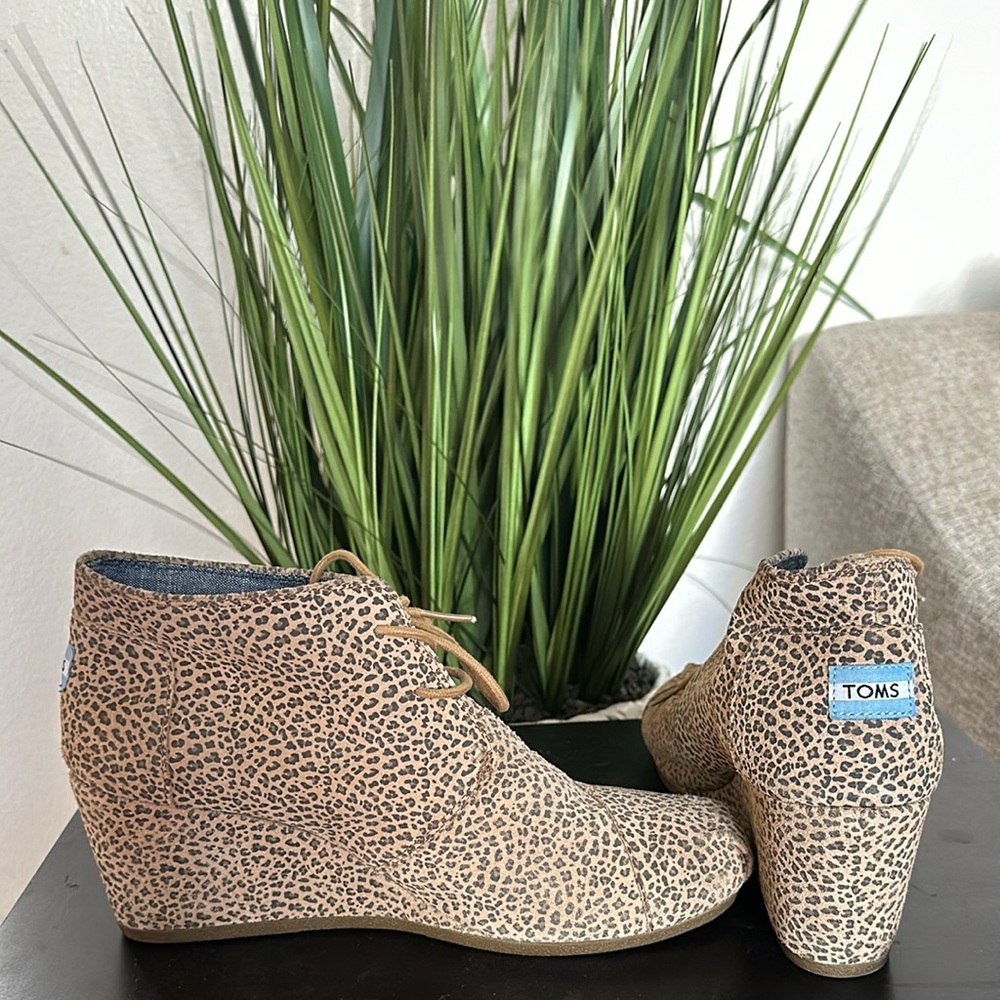 I am selling a size 12 pair of Tom’s ankle boot wedges. Gently used.